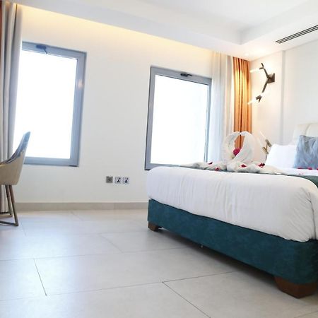 Waterfront Hotel Apartment Lusail Luaran gambar A room at the hotel