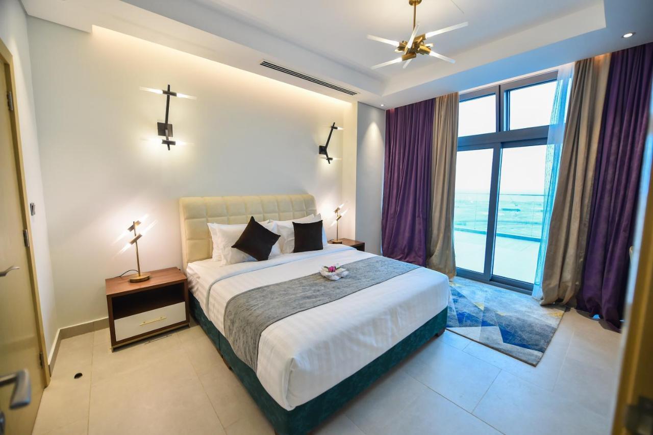 Waterfront Hotel Apartment Lusail Luaran gambar A bedroom at the hotel