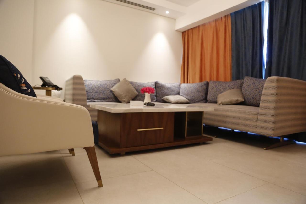 Waterfront Hotel Apartment Lusail Luaran gambar A living room in a house