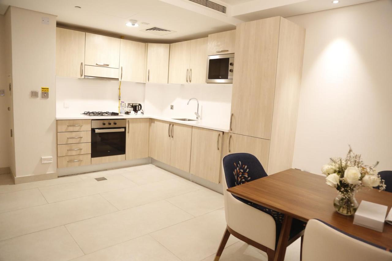 Waterfront Hotel Apartment Lusail Luaran gambar A kitchen in a serviced apartment in London